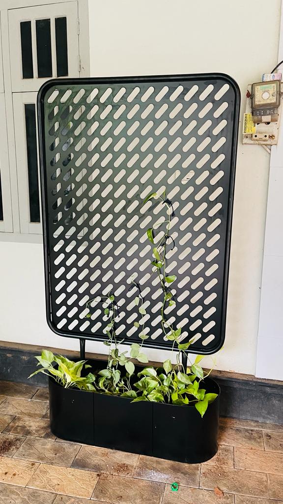 Laser-cut screen panel with planter box