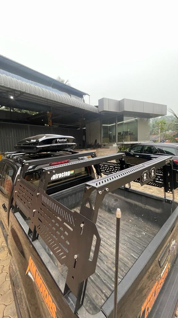 Pickup bed rack with laser-cut side plates