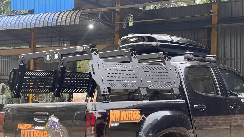 Custom laser-cut cargo rack on a pickup truck