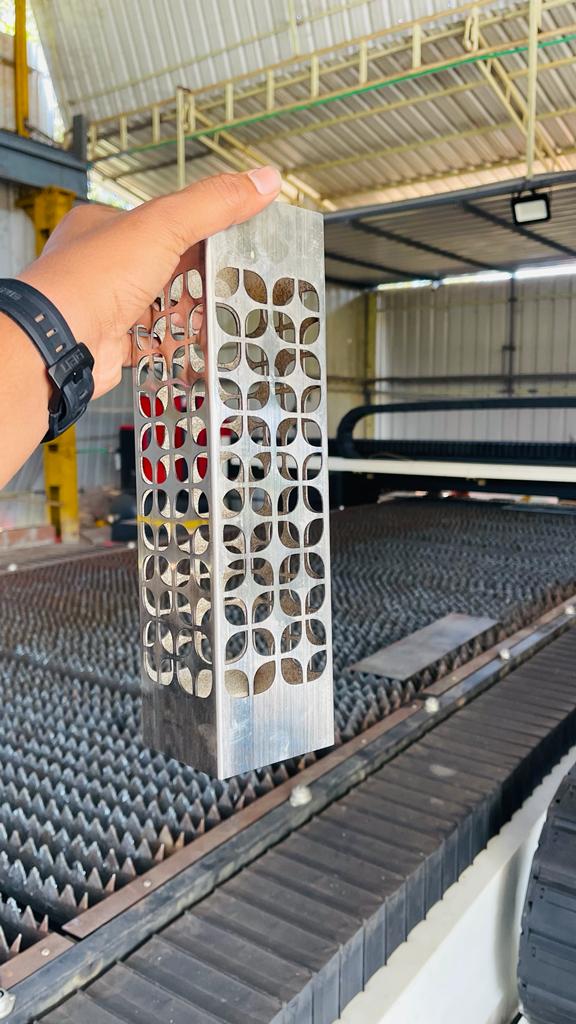 Perforated steel tube cut on the laser