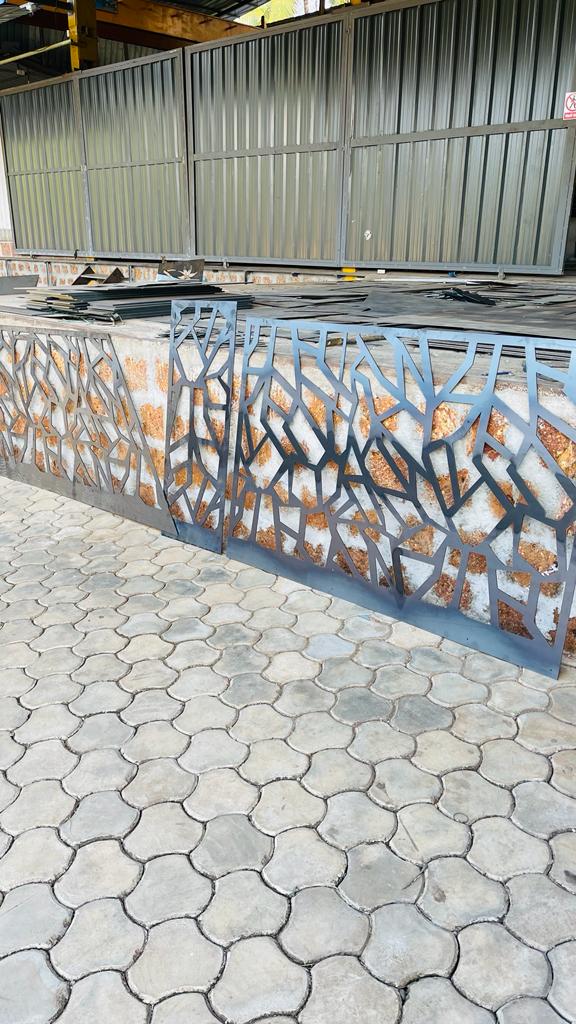 Organic pattern jali panels installed along a boundary wall