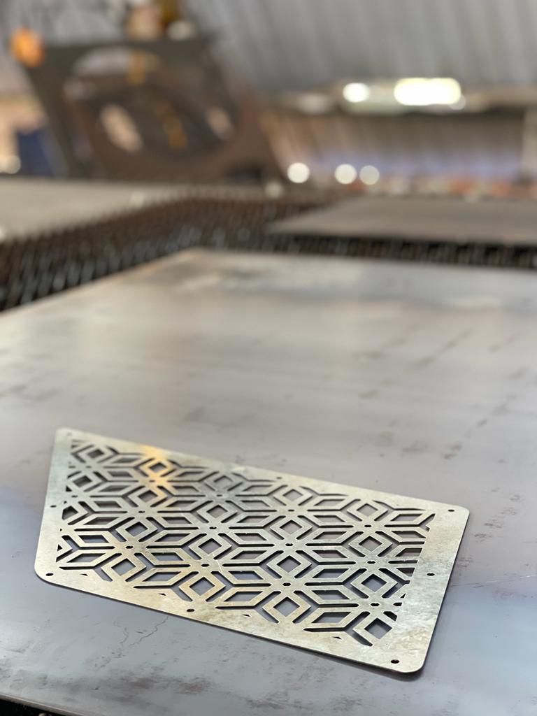 Geometric laser-cut grille