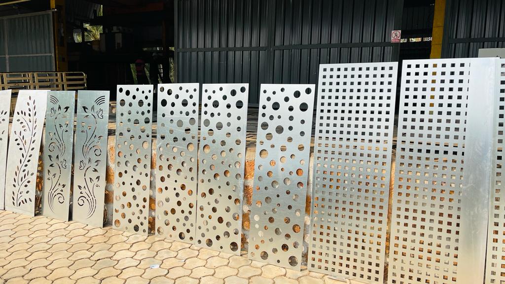 Perforated laser-cut panels with circle and square holes