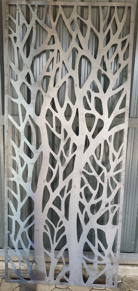 Branch pattern laser-cut panel in stainless steel